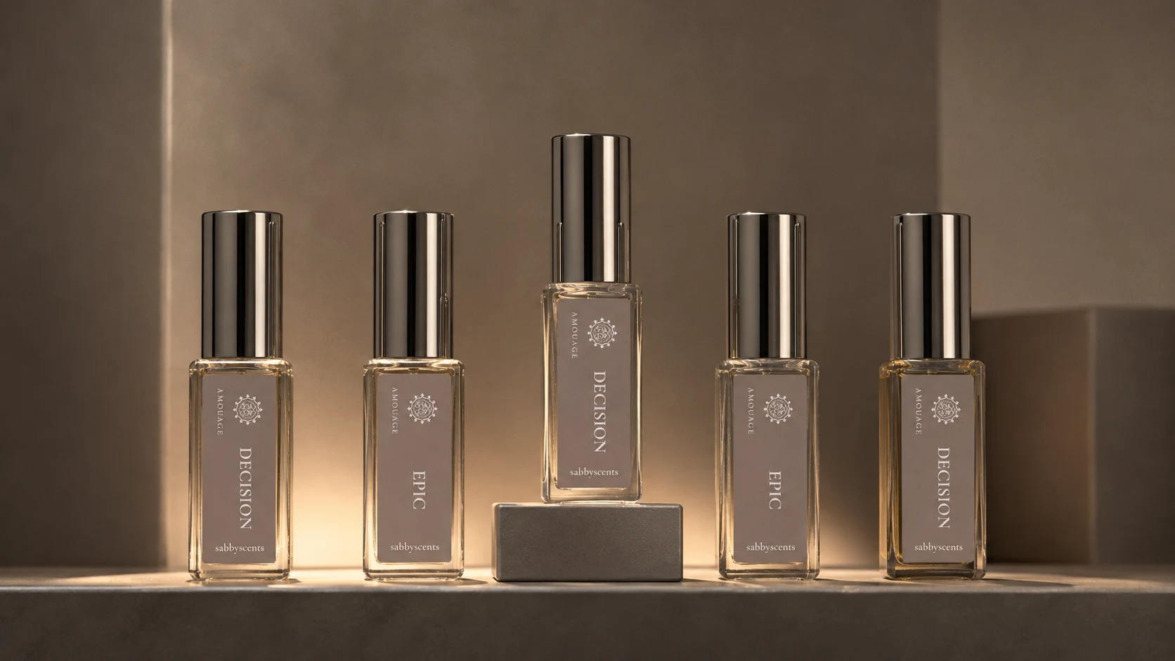 Five SabbyScents decants illuminated in a warm sculptural display